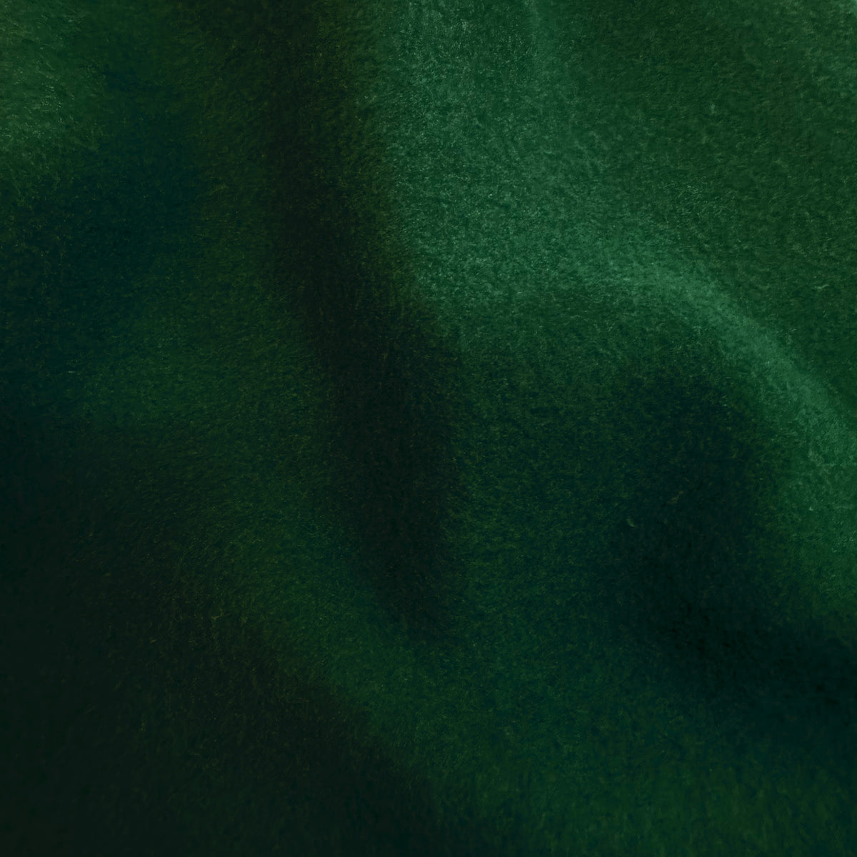 Close-up of dark green fabric texture