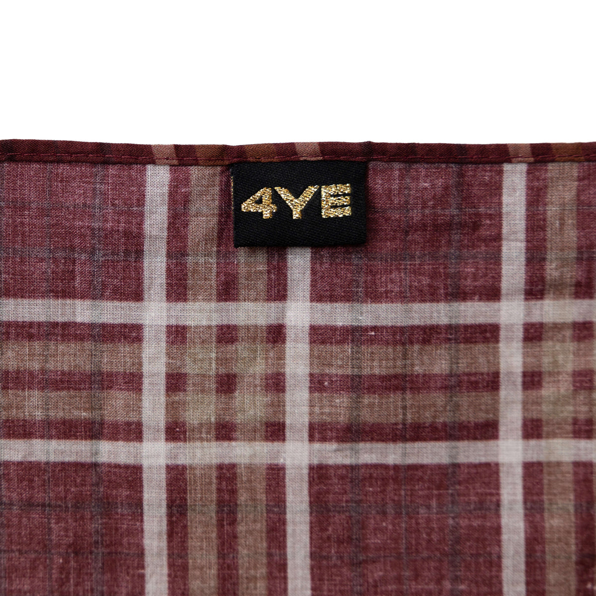 Close-up of fabric with a '4YE' label.