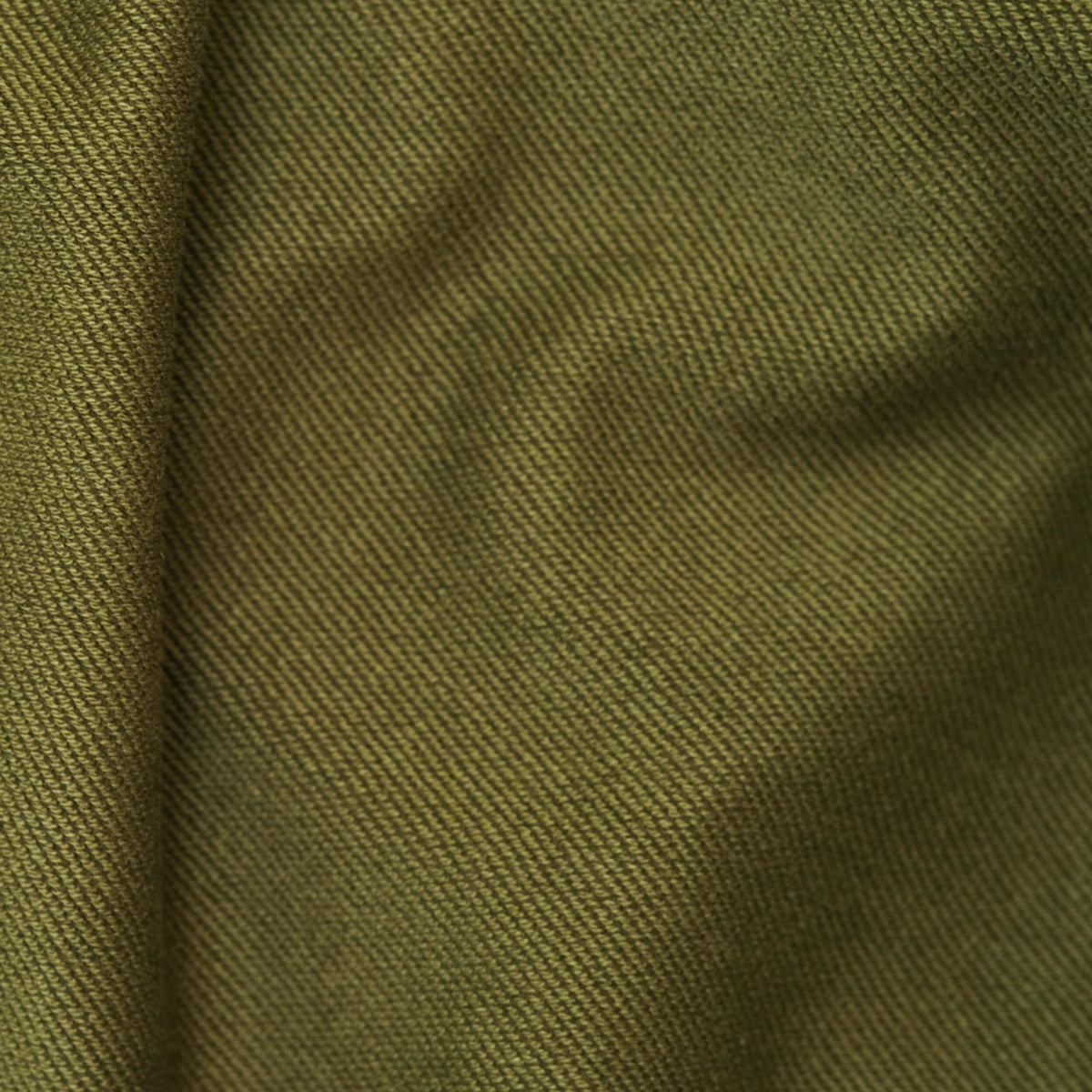 380 GSM Terry fabric in Olive used to make the 4YE Raw Hem Crew