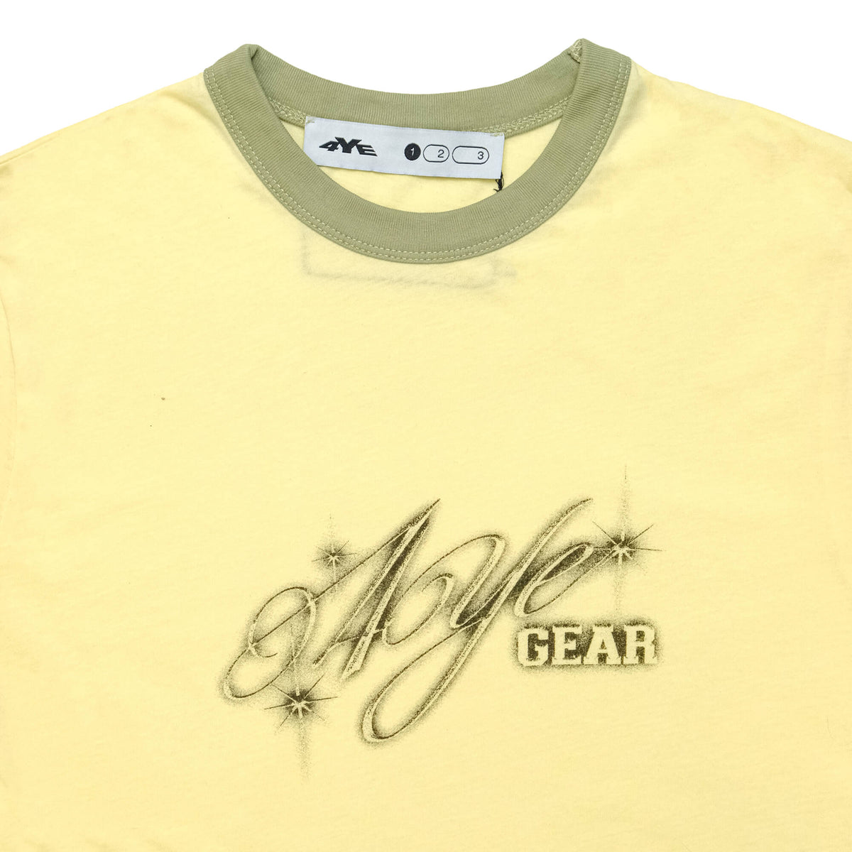 Close up image of starry night ringer tee highlighting the starry night logo, which reads "4YE gear"